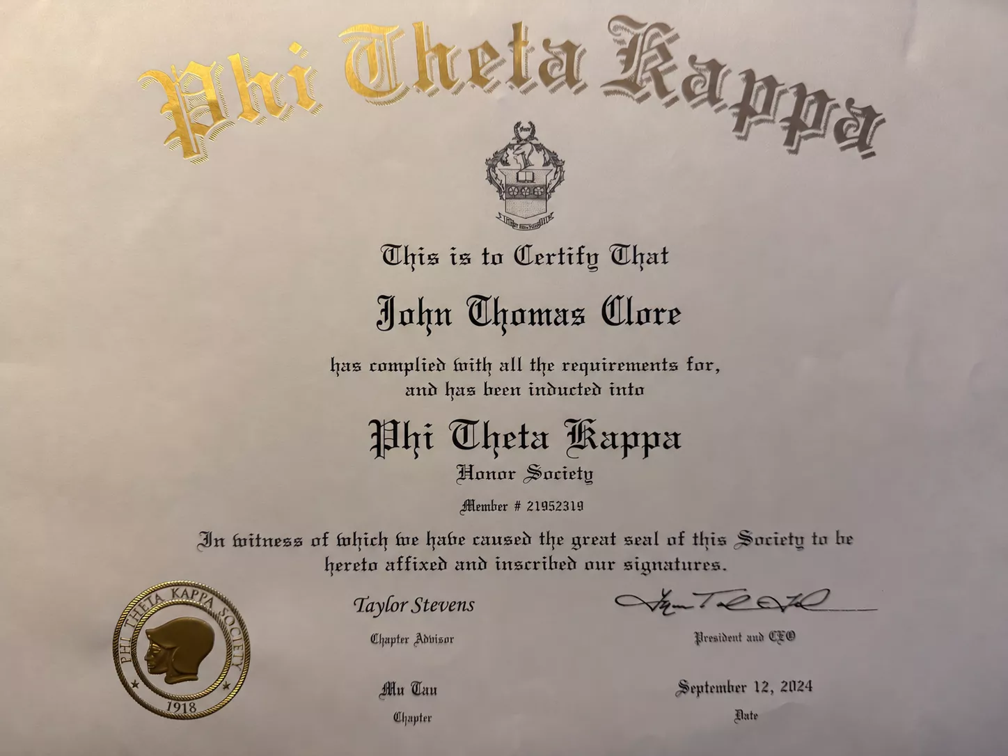 Phi Theta Kappa Honor Society membership certificate for John Thomas Clore, Mu Tau Chapter